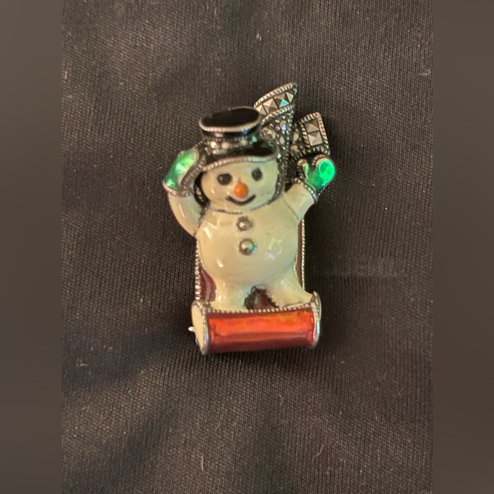 Pre-loved Vintage Judith Jack “ Snowman on Sled” Enamel/ Sterling Silver Pin